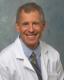 Alan M Kozarsky MD